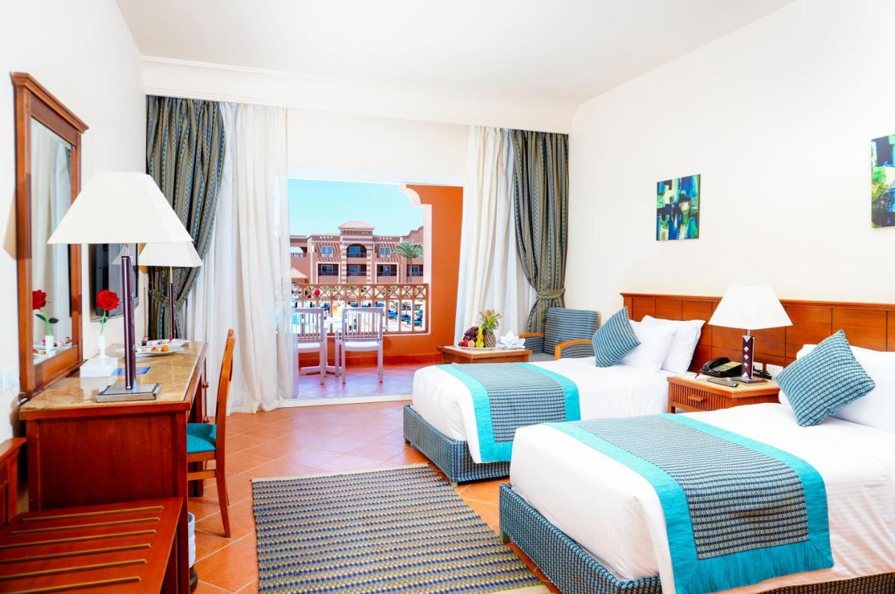 Hotel Charmillion Club Aquapark à Charm el-Cheikh Extérieur photo A room at the hotel
