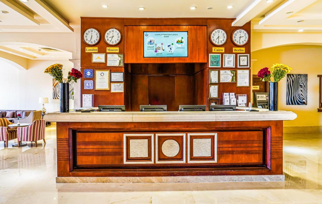 Hotel Charmillion Club Aquapark à Charm el-Cheikh Extérieur photo Reception desk at the hotel