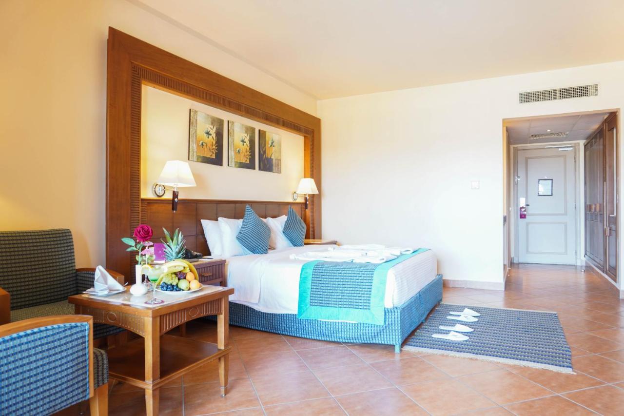 Hotel Charmillion Club Aquapark à Charm el-Cheikh Chambre photo A room at the Hilton Sharm El Sheikh