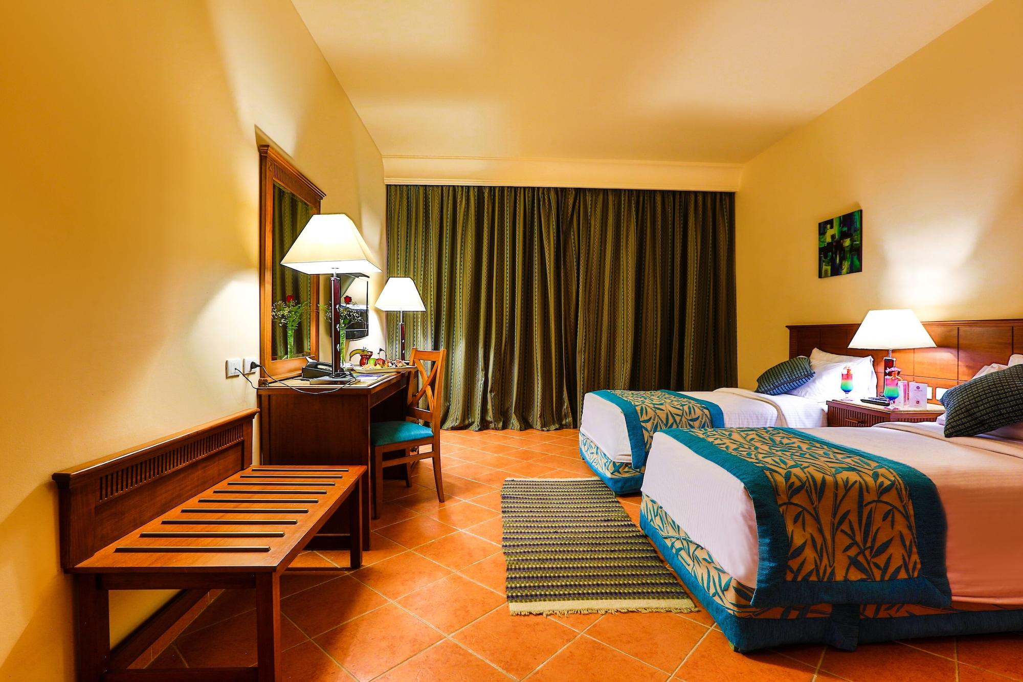 Hotel Charmillion Club Aquapark à Charm el-Cheikh Extérieur photo A room at the hotel
