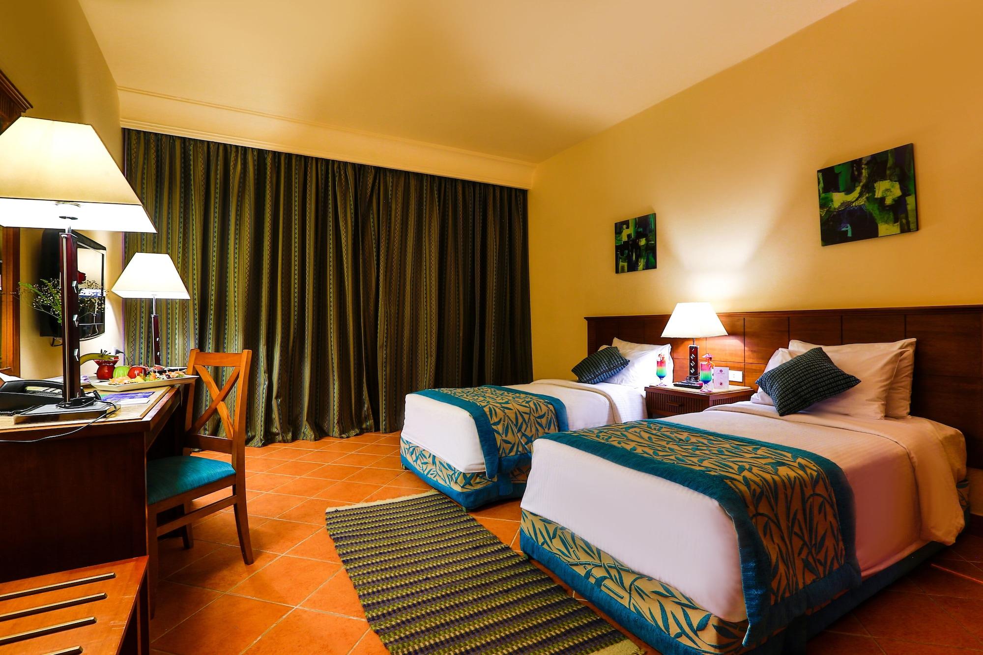Hotel Charmillion Club Aquapark à Charm el-Cheikh Extérieur photo A room at the hotel