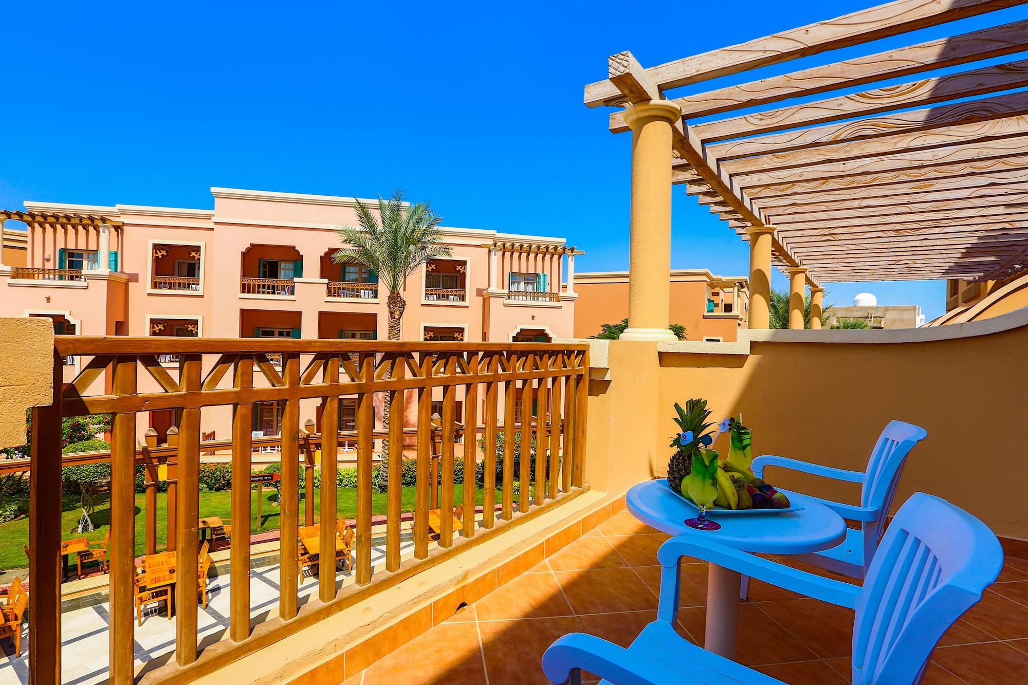 Hotel Charmillion Club Aquapark à Charm el-Cheikh Extérieur photo Balcony of a villa