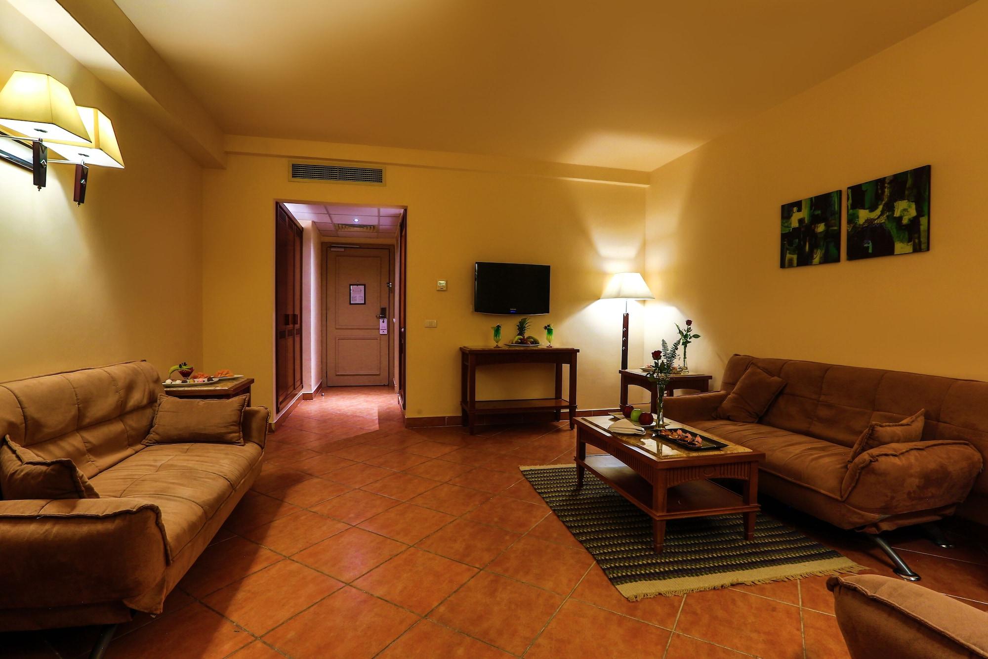 Hotel Charmillion Club Aquapark à Charm el-Cheikh Extérieur photo A living room